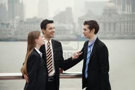 They are talking to each other near the river