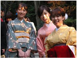 There are 3 women wearing kimono
